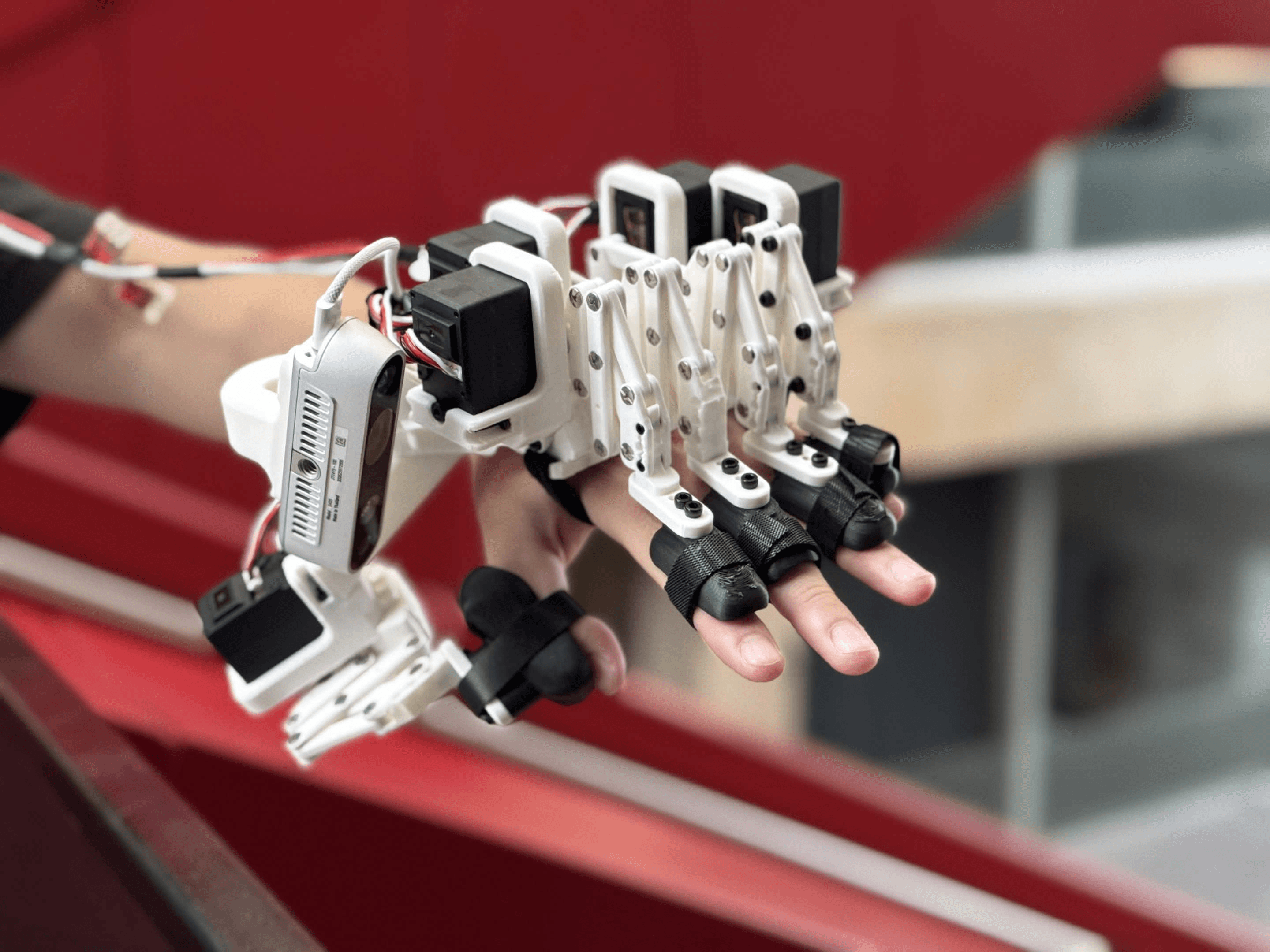 Reflex exoskeleton glove worn on a hand